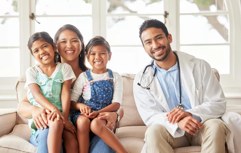 Family with two children at a medical consultation
