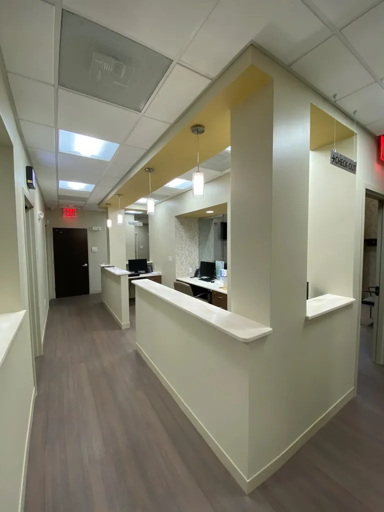 Reception corridor and check-out desk at Health Med
