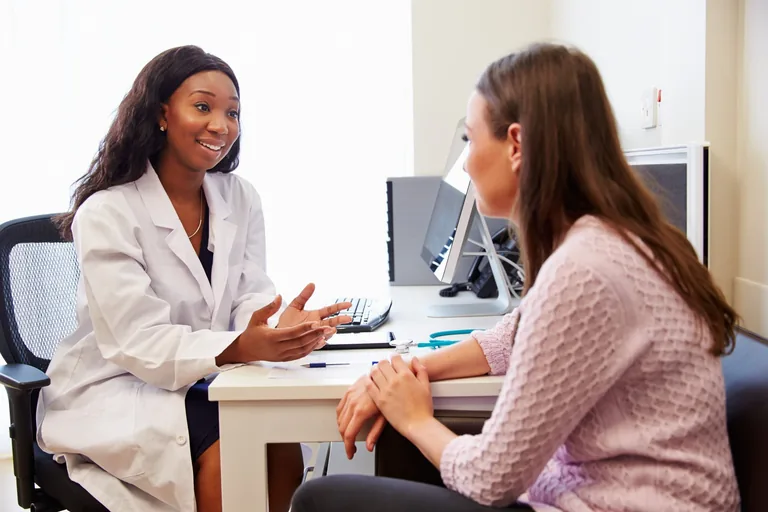 Patient talking with a primary care clinician